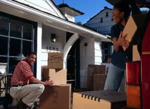 People moving in a foreclosed house